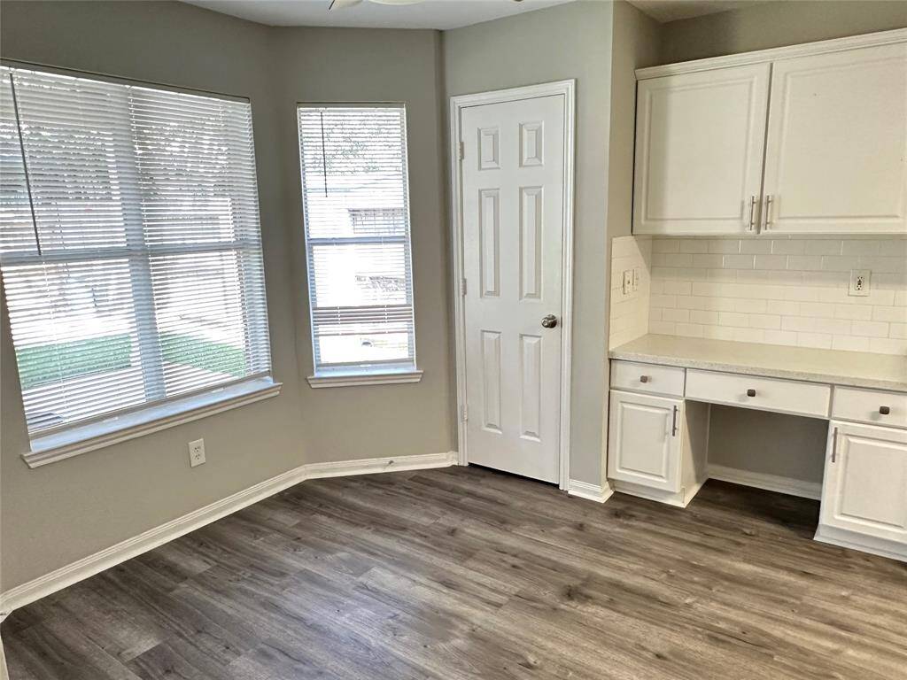 Another look at the breakfast room, pantry and workstation.