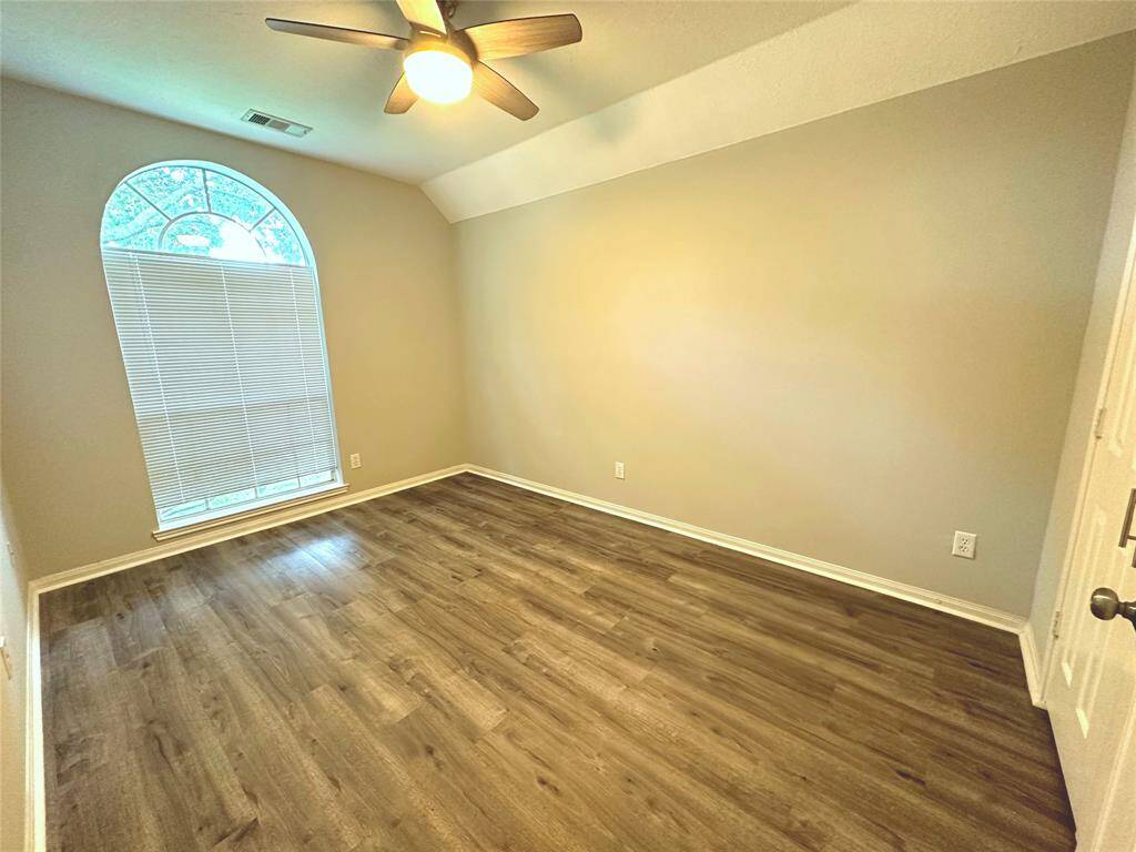 The 3rd of 4 bedrooms also faces the street.