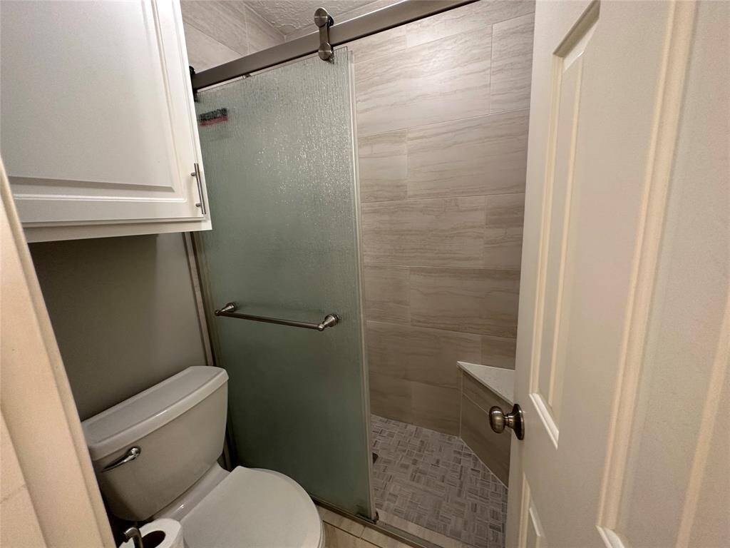 The hall bath has an oversized shower (if a tub is desired you can use the one in the master bedroom).