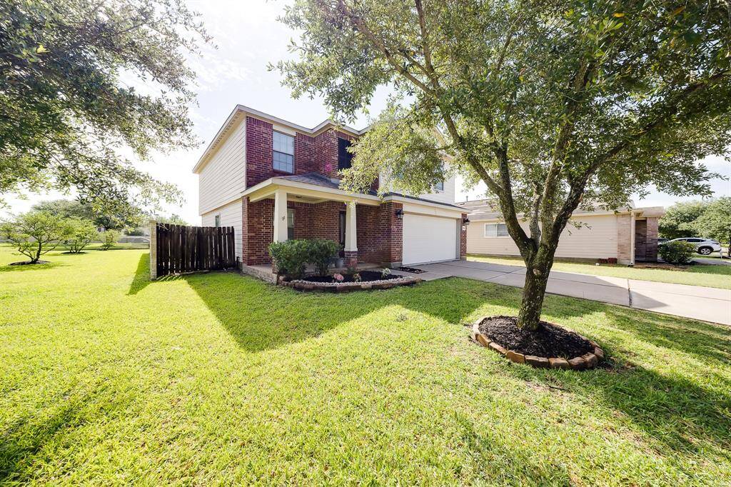 Culdesac lot advantage with great natural shade, manicured lawn, and enhanced front garden space.