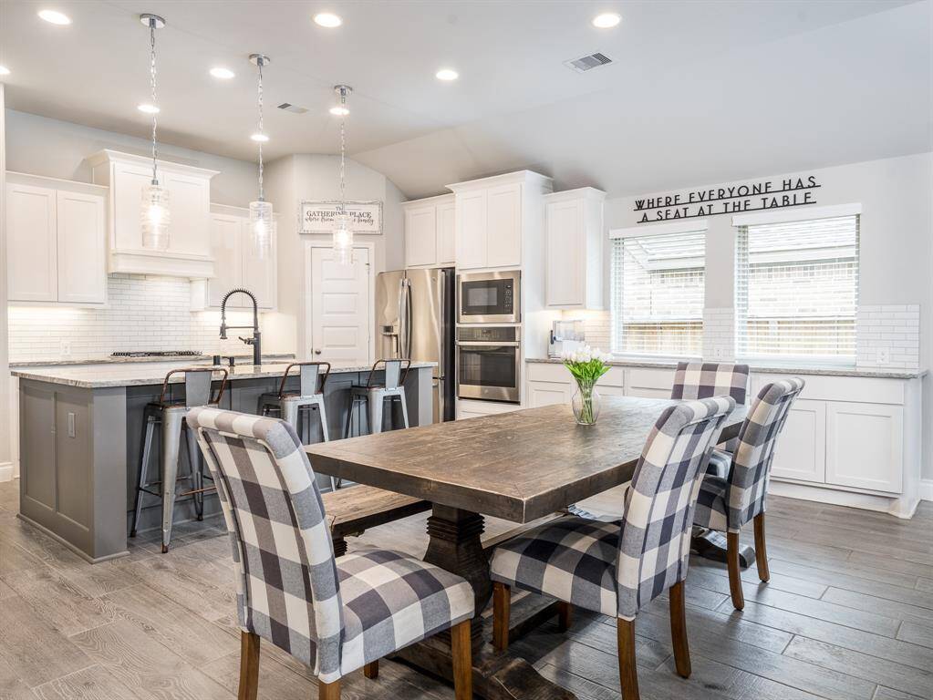 The dining built-in storage is an upgrade you won't find in every Perry Home.