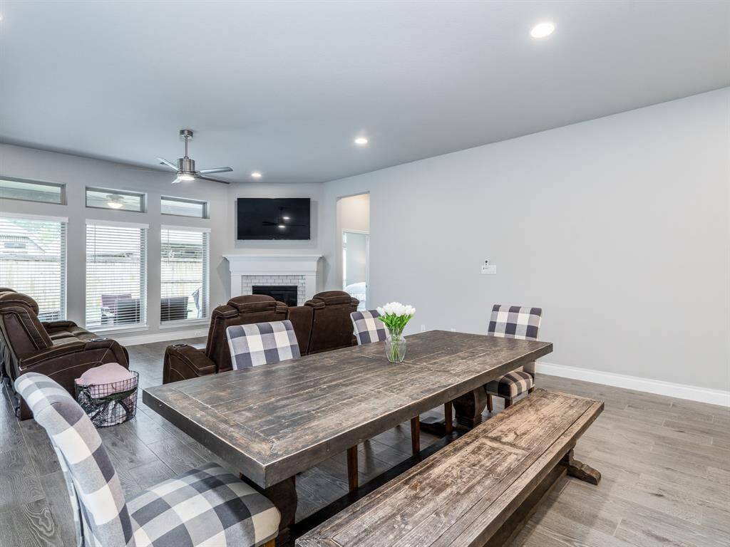 The dining space is large enough to accommodate a large table.
