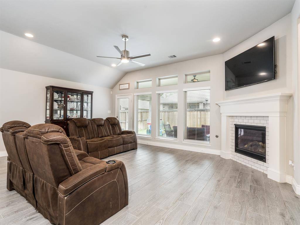 Generously sized living area with tons of windows and natural light.
