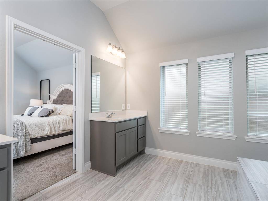 Second quartz vanity will keep things separate and speedy for getting ready in the mornings.