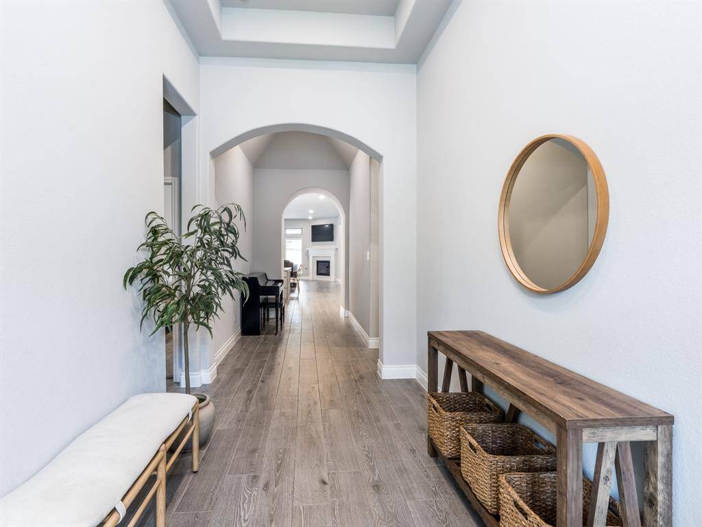 The entry and living spaces were upgraded to a premium wood-look tile.