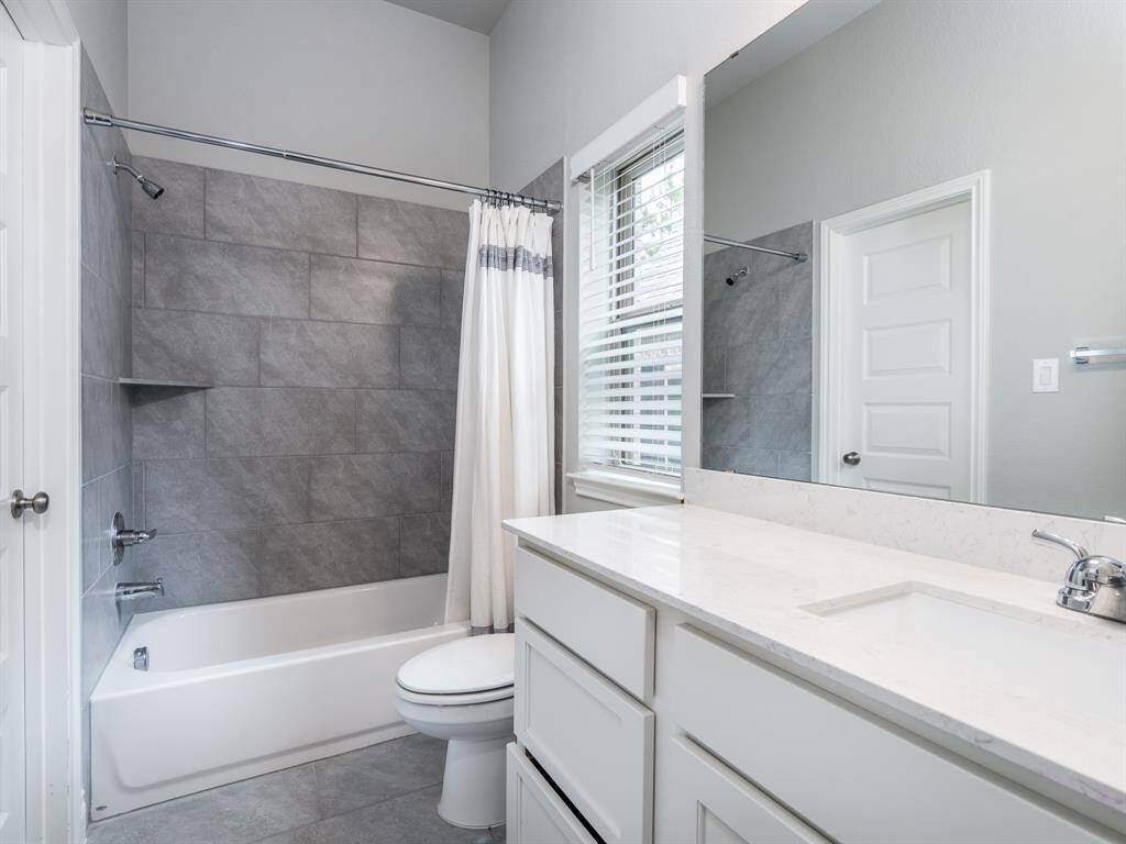 One of the three full baths in the home.