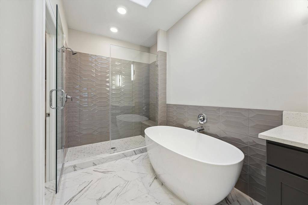 Spa-style bath with freestanding tub,