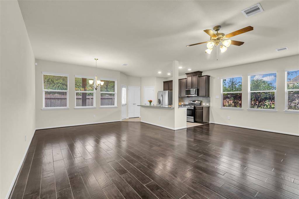 Enjoy a spacious living and dining area with an open kitchen, perfect for everyday living and entertaining.