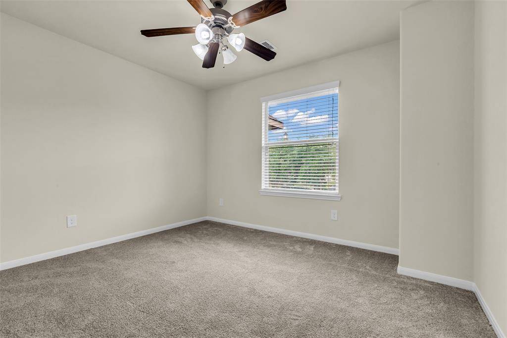 Good sized bedroom featuring brand-new carpet