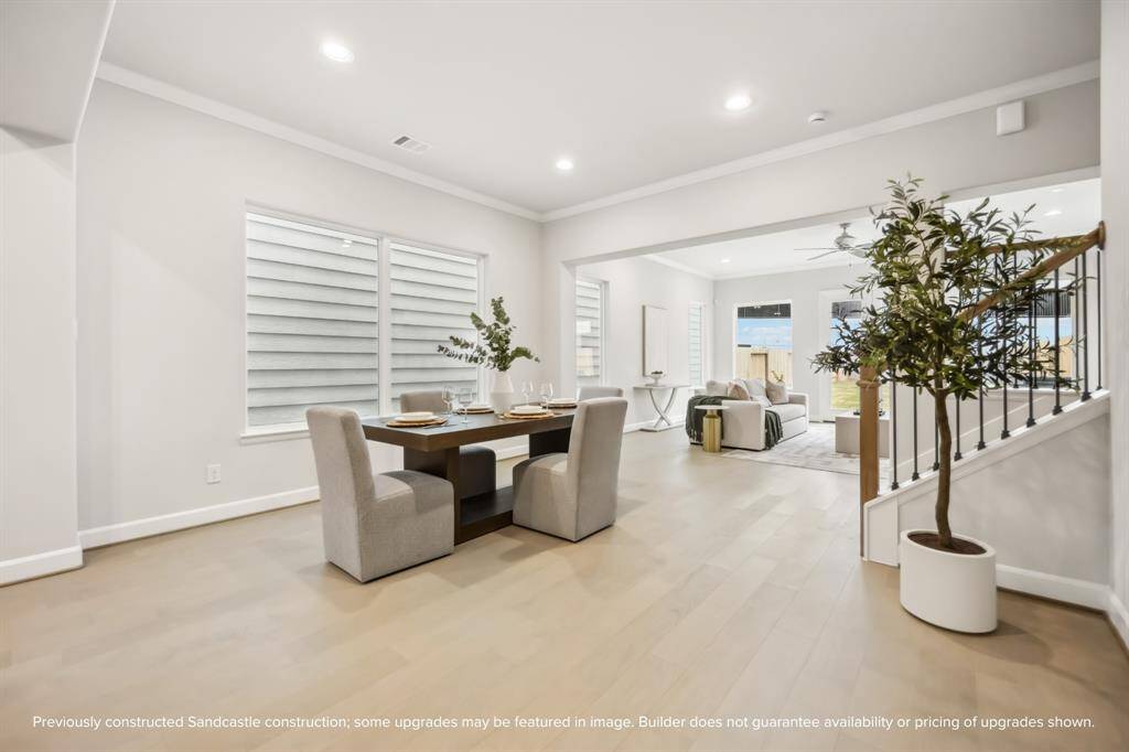 Bask in the natural light from a wall of windows, making every meal feel special.