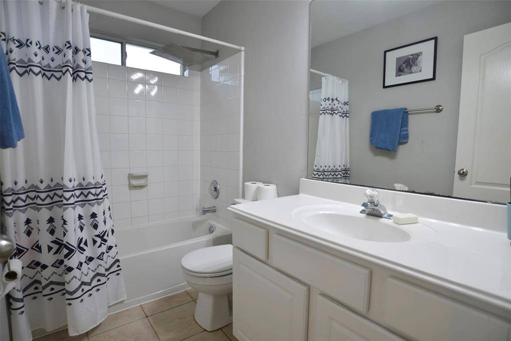 One of the 2 upstairs bathrooms