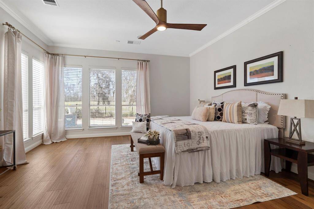 Step into the sanctuary of the expansive primary bedroom.