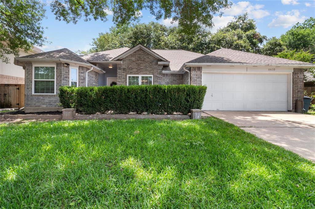 Charming curb appeal and shady mature trees welcome you home!
