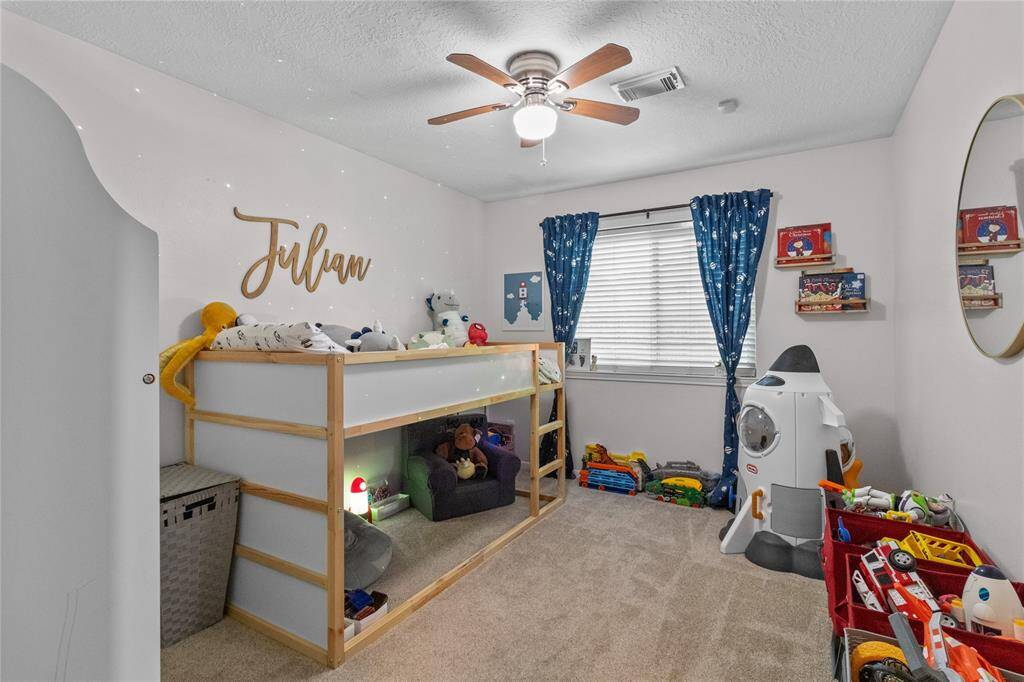 Out-of-this-world fun! This secondary bedroom is designed with imagination and play in mind. s