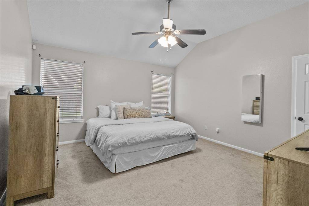 Your restful retreat! The primary suite features vaulted ceilings, great natural light, and plush carpet underfoot.Spacious enough for oversized furniture with room to spare.