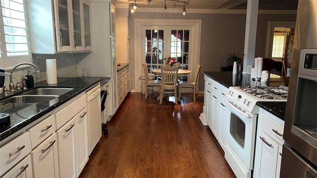 Open concept kitchen with granite countertops....