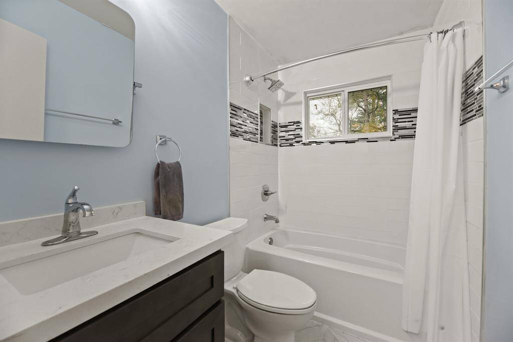 2nd full bath upstairs with updated shower