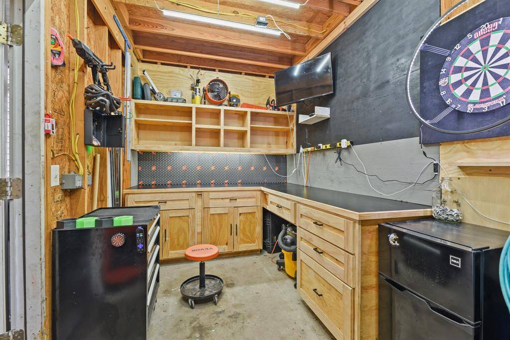 Storage shed with covered carport attached.