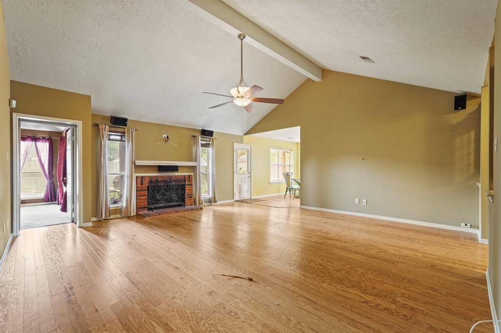 Large living area with high ceiling