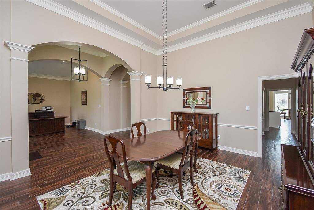 Butlers pantry to right of the photo for ease in entertaining and serving your family and guests.