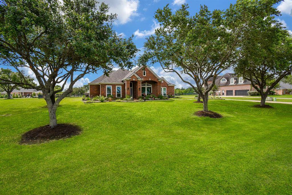 Completely updated 3,600 SF one story on estate size waterfront lot with trees galore.  This beauty sits on almost 3/4 of an acre and is meticulously manicured.