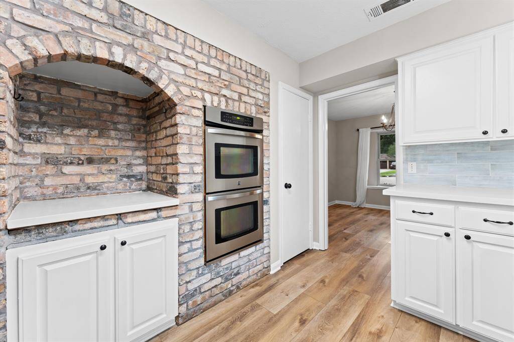 This brick kitchen alcove gives a unique perspective to the kitchen.