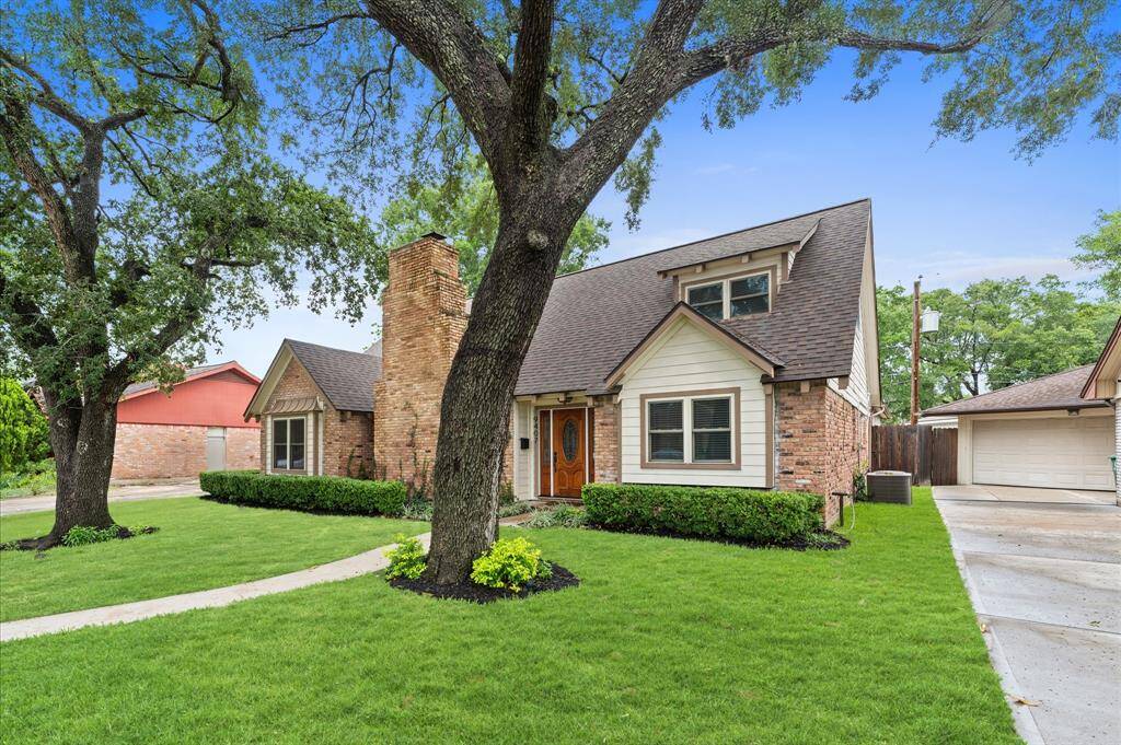 Beautiful view of the lush green lawn and mature trees!