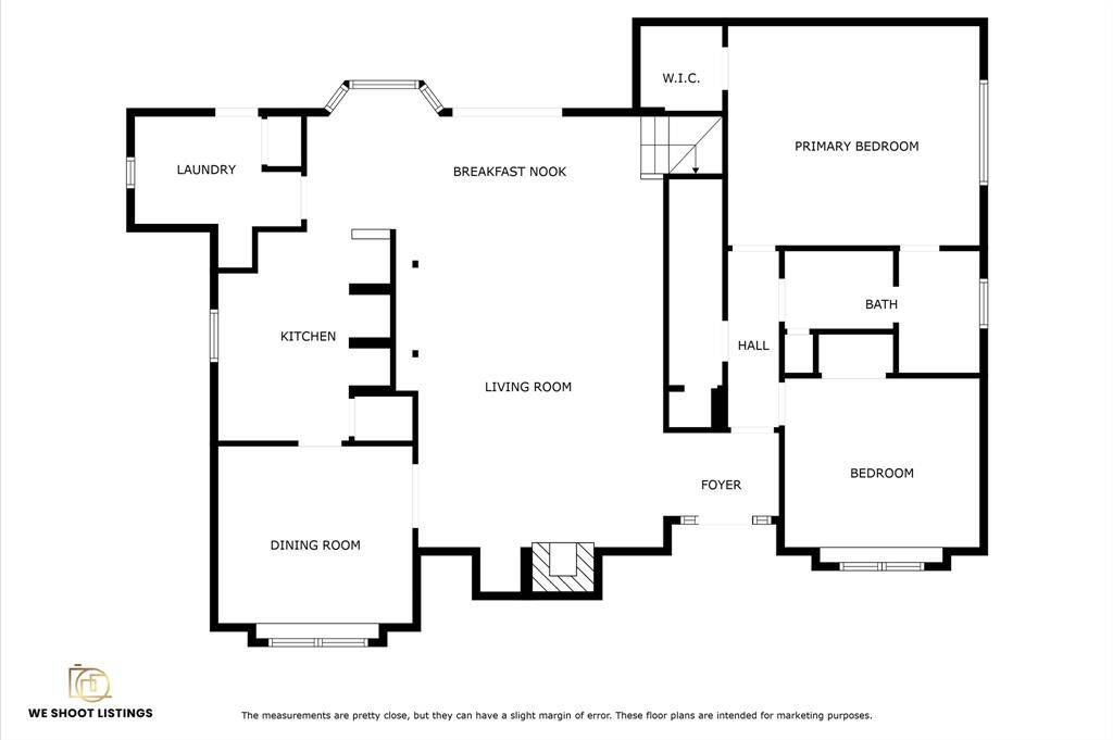 First floor plan features a spacious layout with a primary bedroom and walk-in closet, an additional bedroom, a bath, and a large living room. The kitchen and breakfast nook are adjacent to the living space, with a separate dining room and laundry area. The foyer connects to a hall leading to the Primary and bedroom/study!
