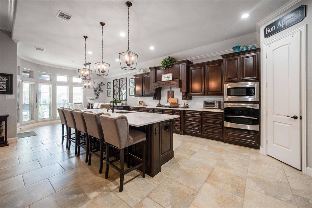 Luxurious kitchen with sleek new marble countertops.