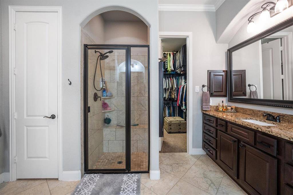 Expansive walk-in shower for ultimate comfort.