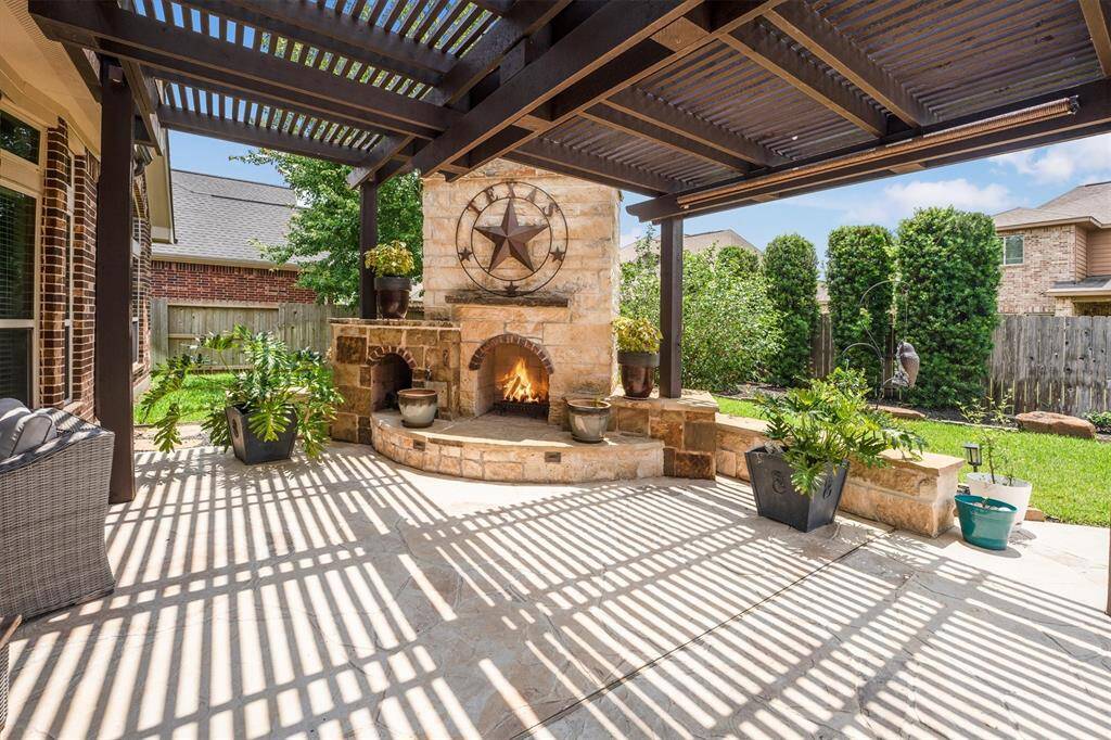 Cozy up to this amazing fire place. You'll be begging for it get cold!