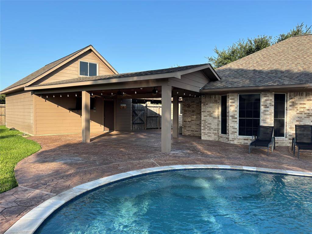 Huge covered patio with ample room for your entertaining ease and relaxing needs.
