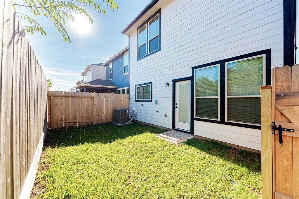 a small, fenced backyard