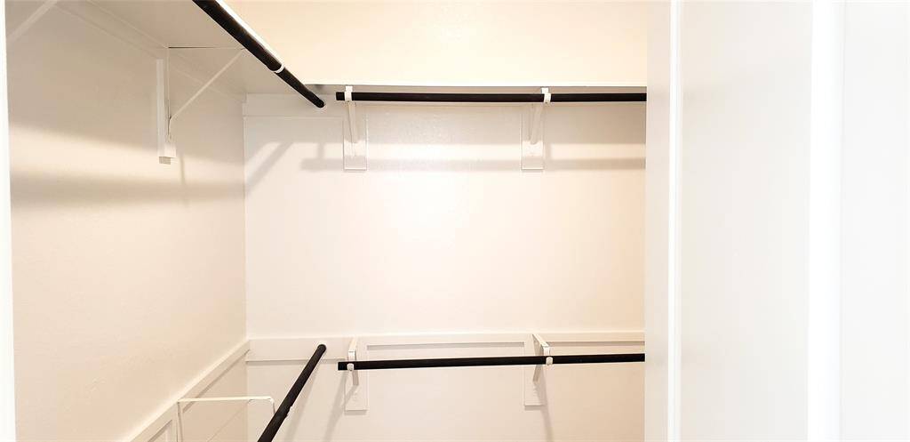 Walk-in closet in the primary