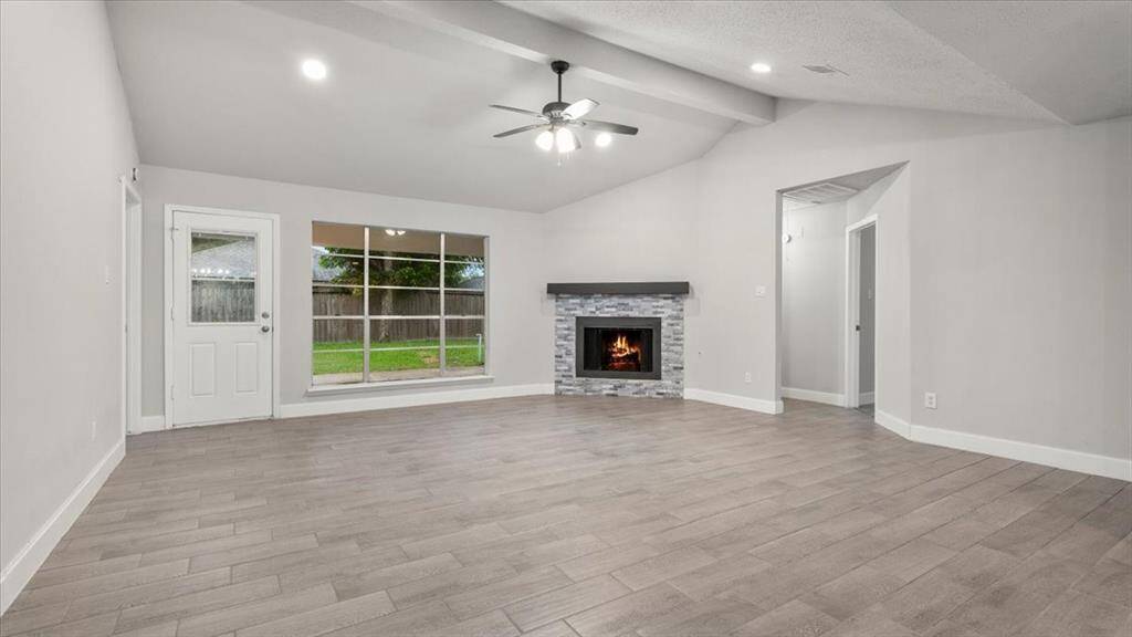 Open concept floor plan. Brand new tile flooring installed. New paint all throughout.