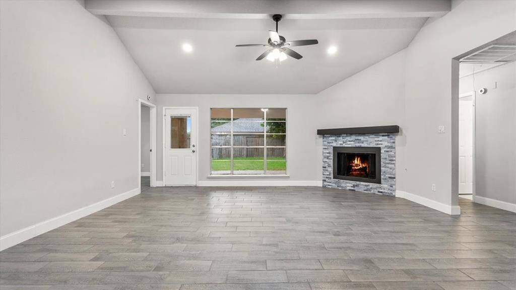 Open concept floor plan. Brand new tile flooring installed. New paint all throughout.