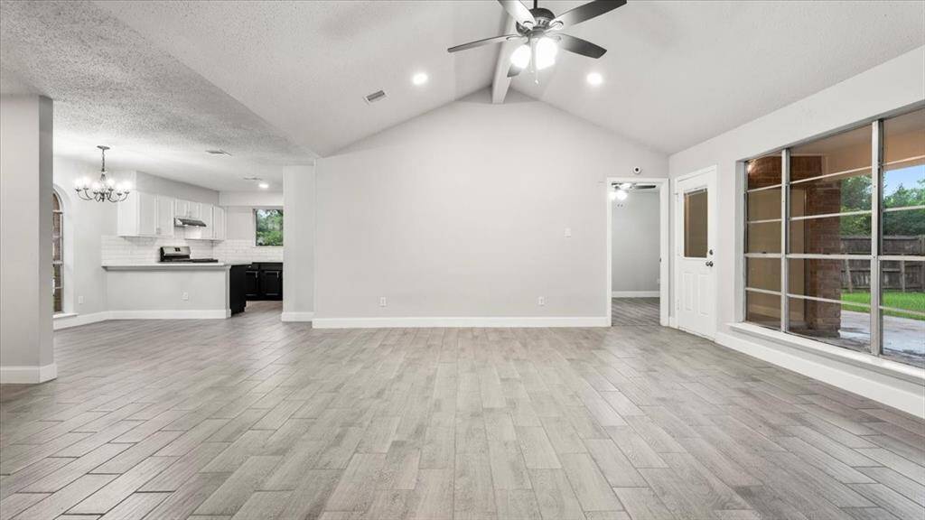 Open concept floor plan. Brand new tile flooring installed. New paint all throughout.