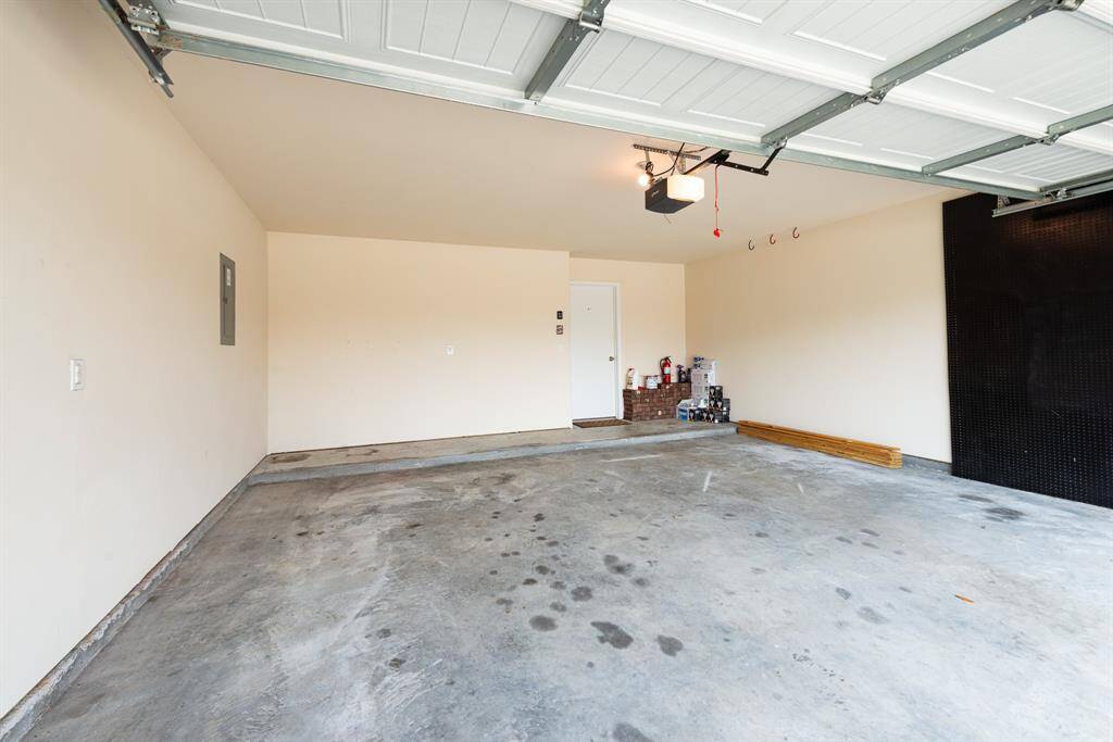 2 car garage with peg board for organization