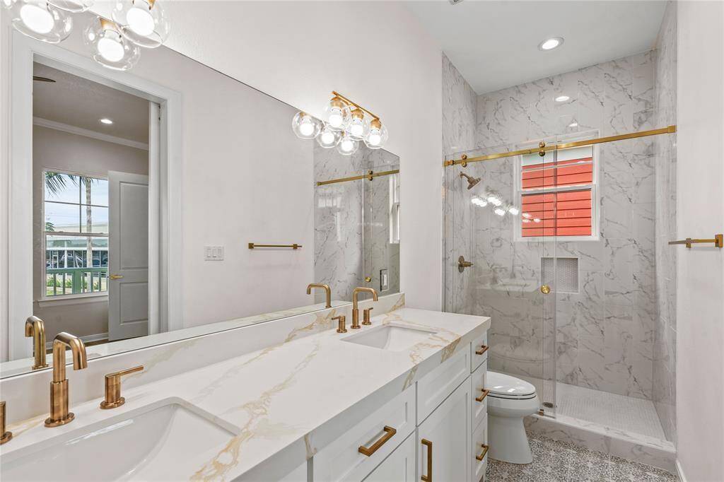 PRIMARY BATH WITH WALK IN SHOWER AND DESIGNER FINISHES