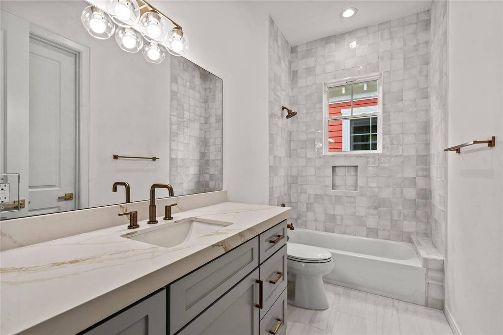 SECONDARY BATH ACCESSABLE FROM BEDROOM AND AHLLWAY