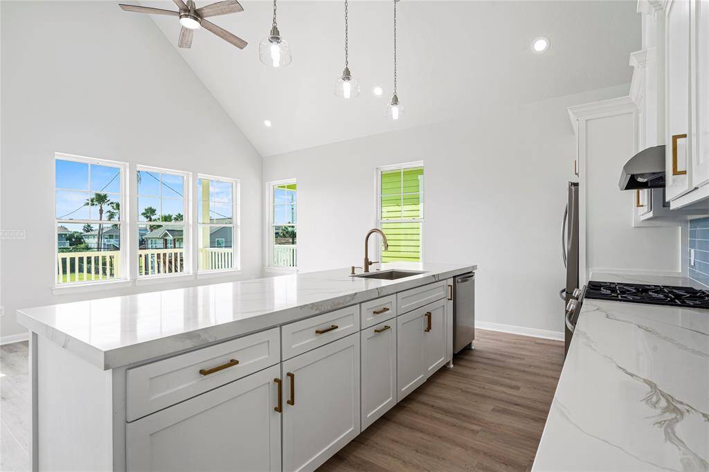 VIEW FROM KITCHEN TO LIVING ROOM VAULTED CIELINGS