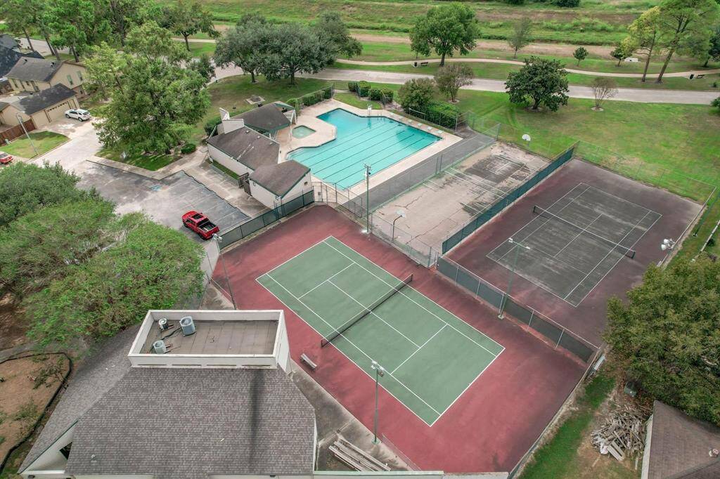 HOA amenities include: Community Garden, Dog Park, Miles of Walking/Jogging Trails, Pool, Basketball courts, Tennis and 2 Playgrounds.