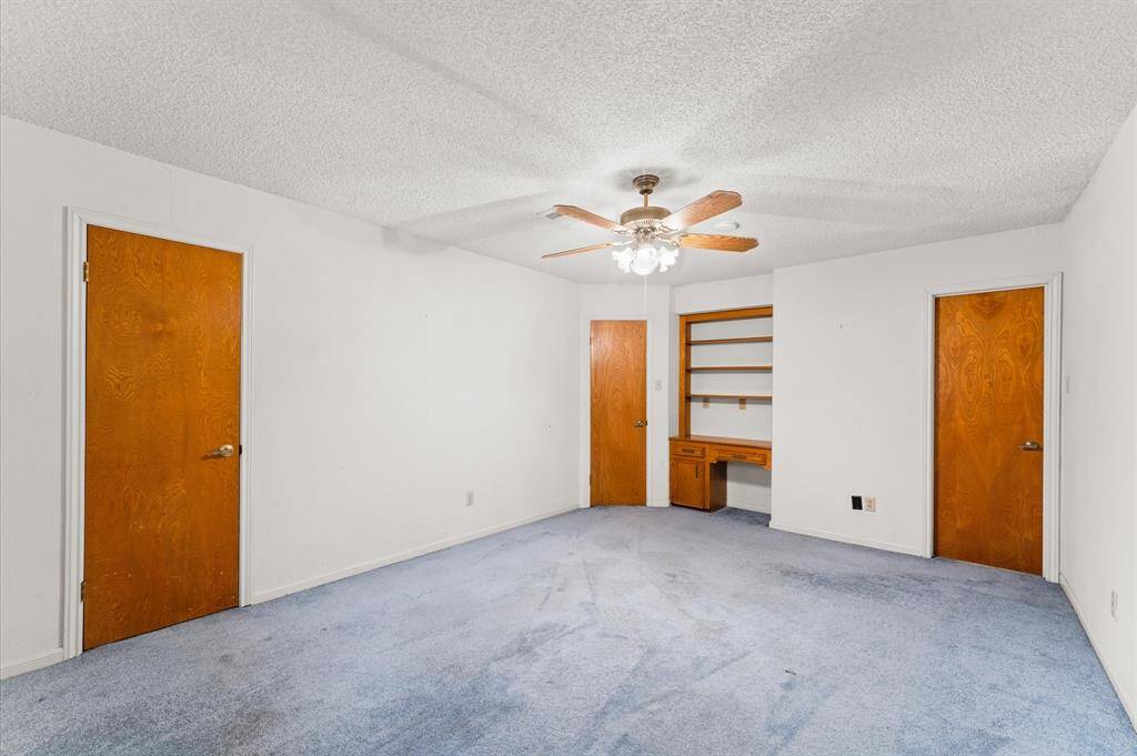 Bedroom 2 with walk in closet, built ins and full ensuite bath