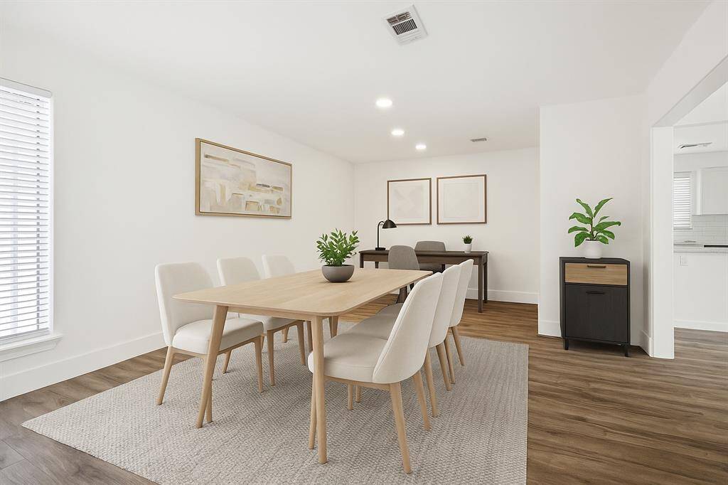 Alternate view of dining room facing the entryway of the home.