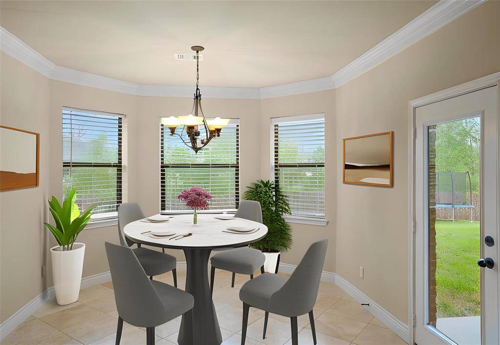 Virtually staged breakfast room.