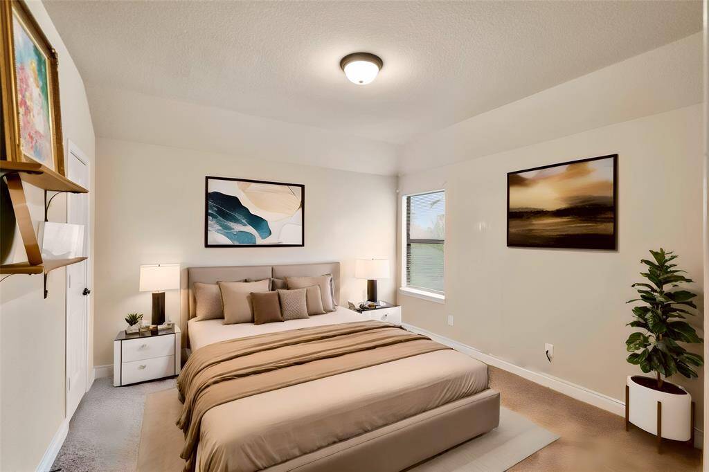 Virtually staged secondary bedroom.