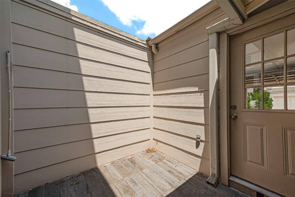 Courtyard connected to the house takes you into the attached garage.