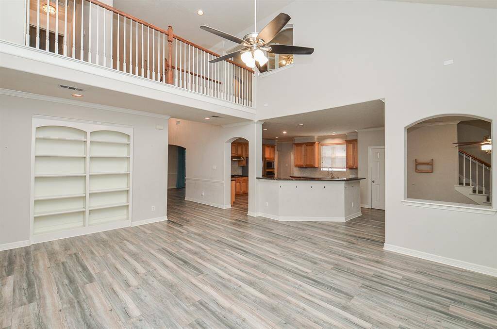 Main family area. Built in cabinets and a cozy fire place.
