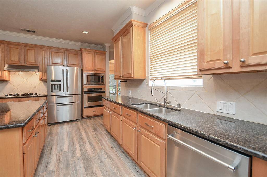 This kitchen has storage built in every space. A true chefs kitchen. New dishwasher.
