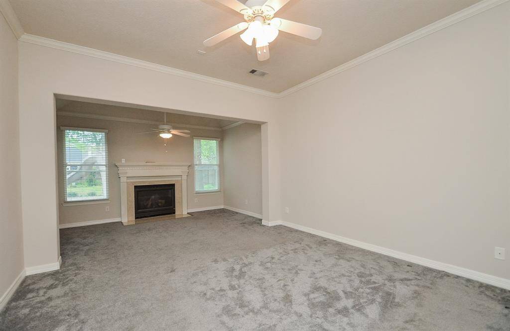 Primary Bedroom. Currently has carpet but has the option to be removed and stained concrete under the carpet.